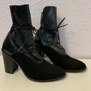 Intentionally blank black leather boot